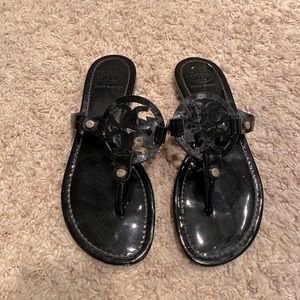 Tory Burch patent leather sandals.